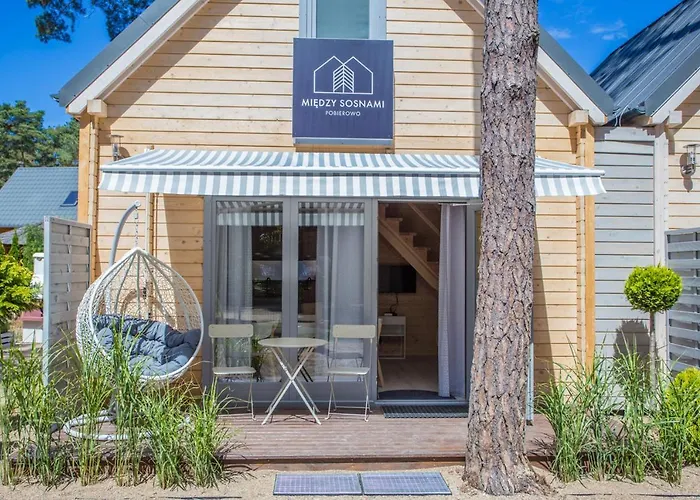 Miedzy Sosnami ロッジ ポビエロボ